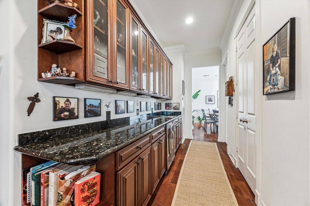 Butler's pantry has an amazing amount of storage and a wine refrigerator.  The walk-in pantry is on the right.