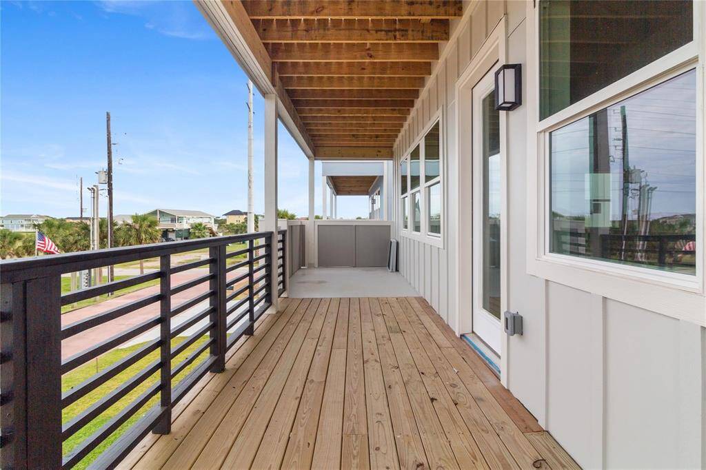Enjoy entertaining in this spacious, covered wooden deck with a bay view. Located on the first floor, this deck is ideal for indoor-outdoor usage!