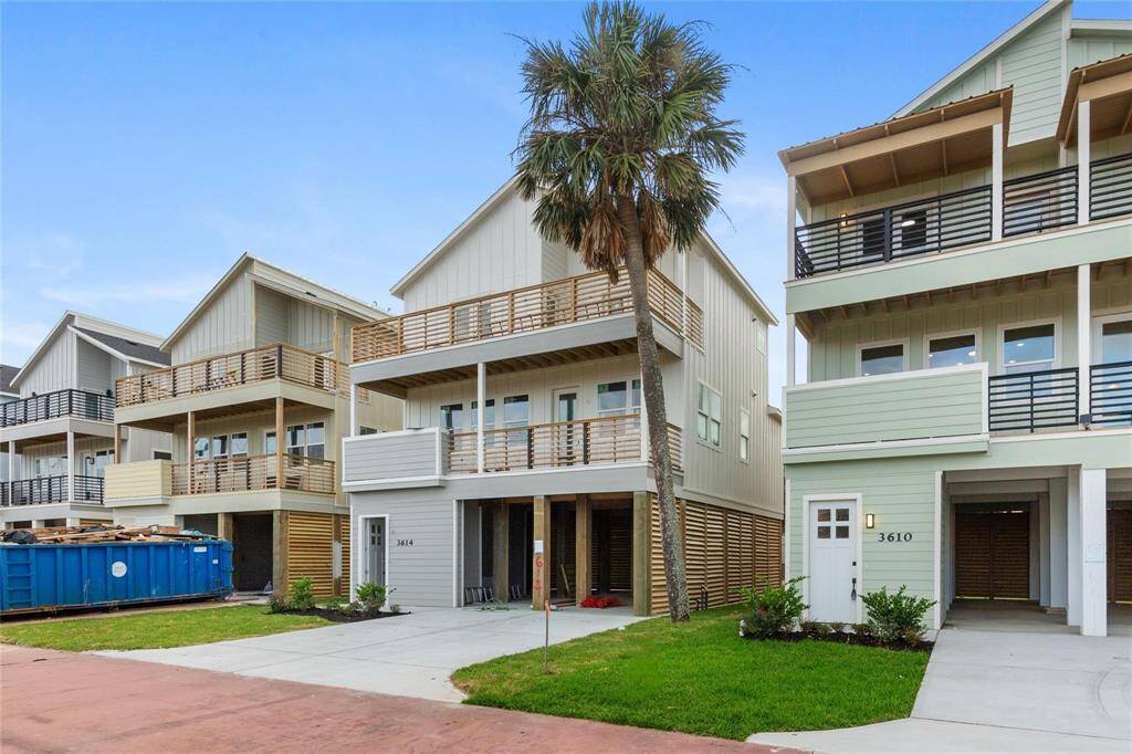 Second home from the right in a row of five elegant residences.