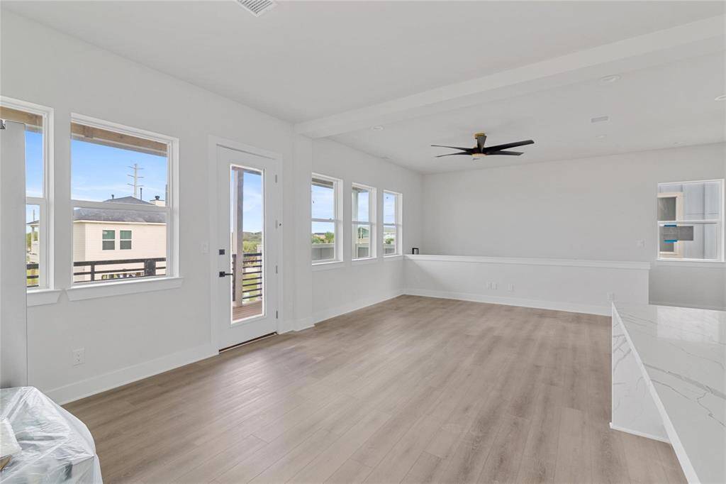 Entertain in this sunlit, open-plan dining area adjacent to the living room and modern kitchen.