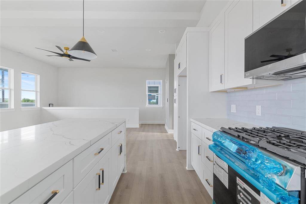 Clean, minimalist aesthetic flows through the entire home along with ample natural light.
