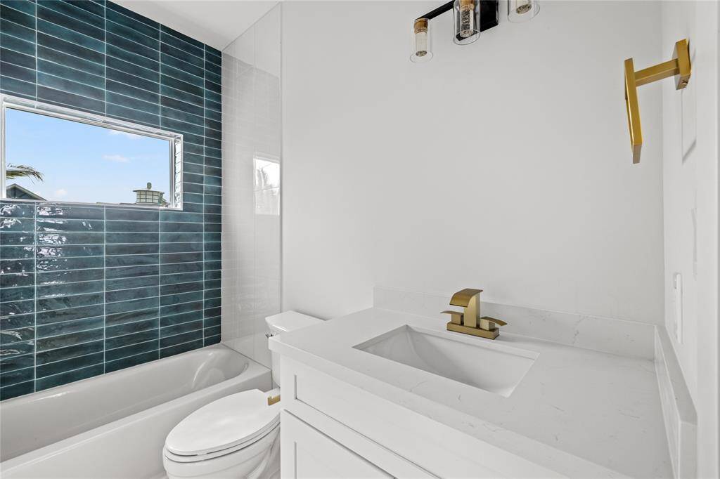 Primary bathroom with gorgeous shower and contemporary finishes.