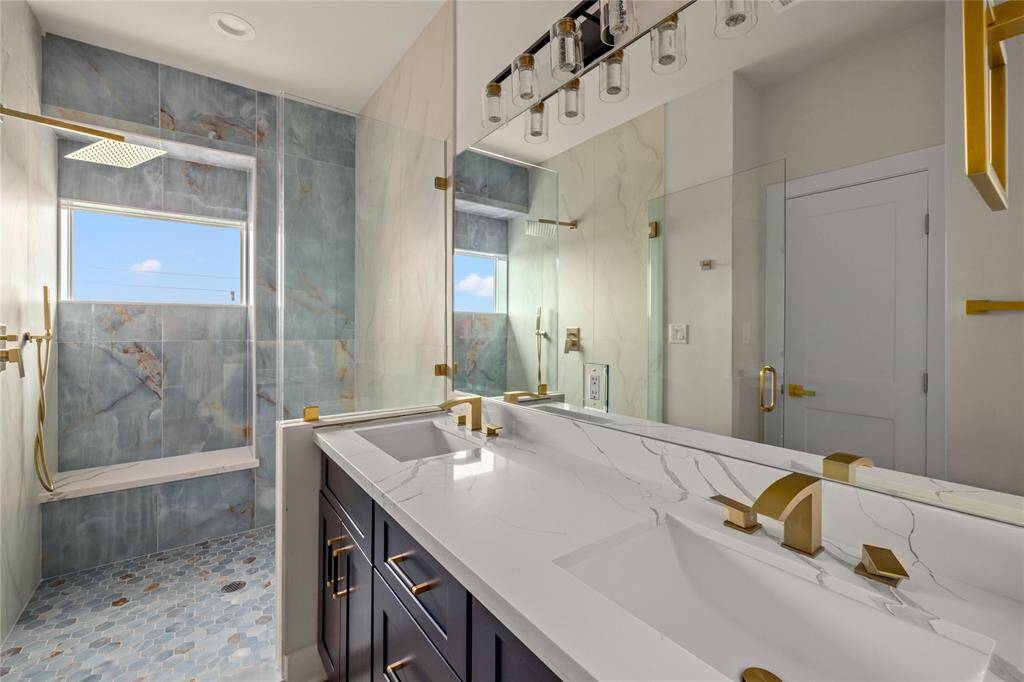Custom tile work in each bathroom