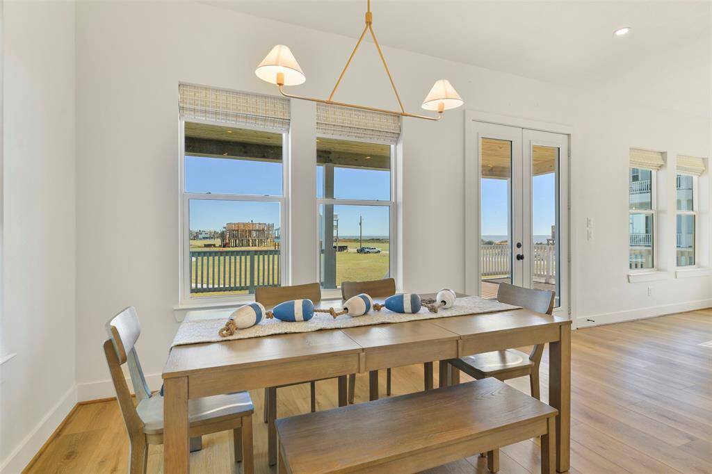 Dine with a view! This home offers PROTECTED views in the back and front of the house. This inviting dining space is perfect for unwinding and creating memorable moments with family or guests.