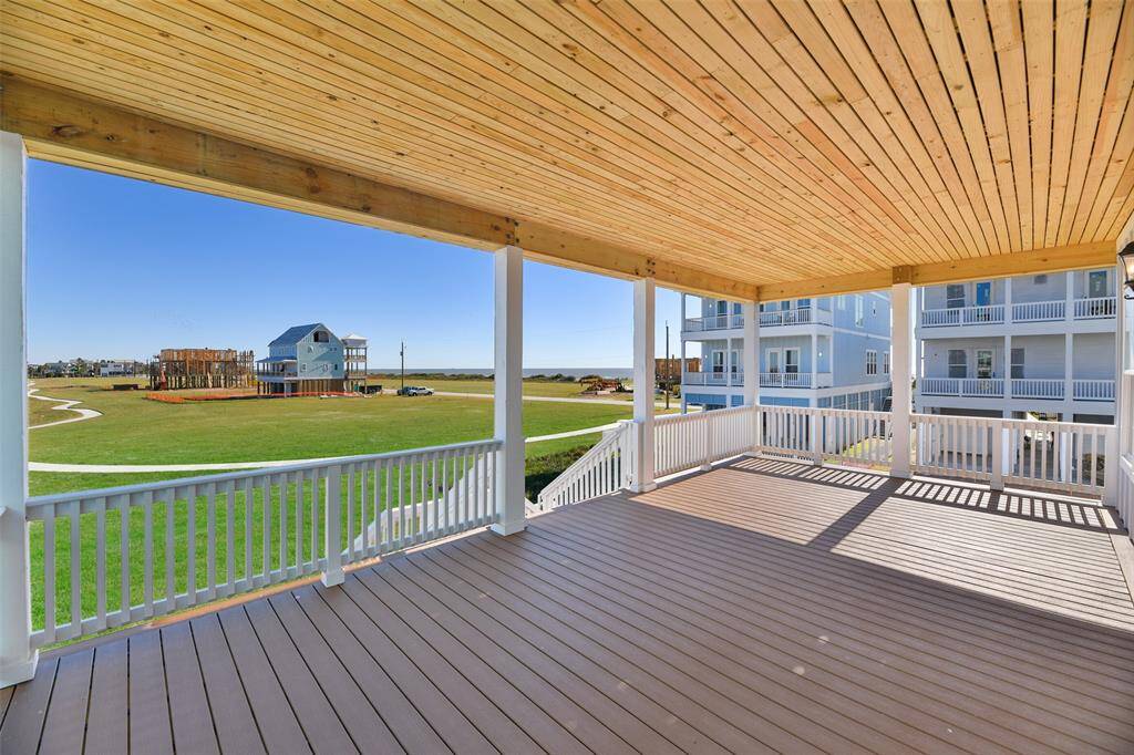 The same main floor back deck provides a breathtaking vantage point with sweeping Gulf views, creating the perfect setting to relax and take in the beauty of coastal living.