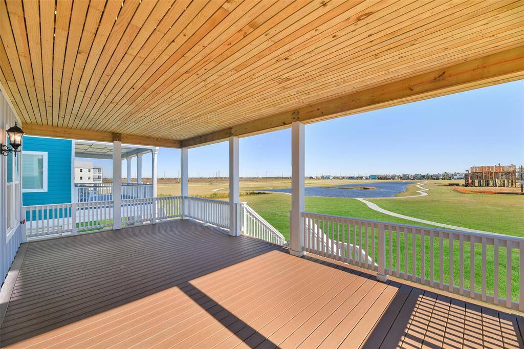 The main floor back deck of this home offers a peaceful escape, overlooking the pond and protected greenspace. With these stunning, unobstructed views preserved for a lifetime, you'll never miss a view!