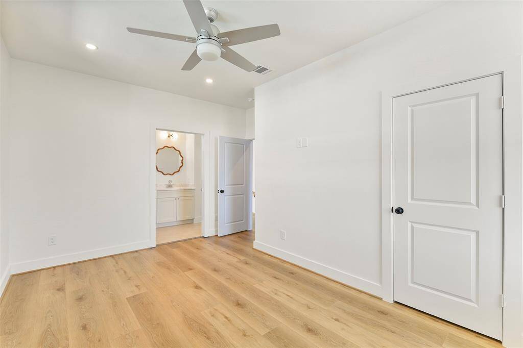 This top-floor bedroom offers the ultimate convenience and privacy, complete with its own ensuite featuring elegant custom designer fixtures.