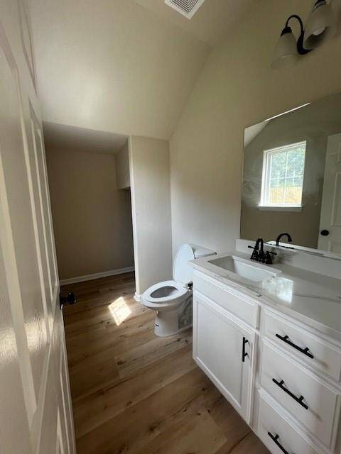 Half bathroom with storage area.