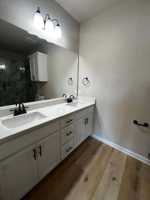 Primary bathroom with his & hers sinks.