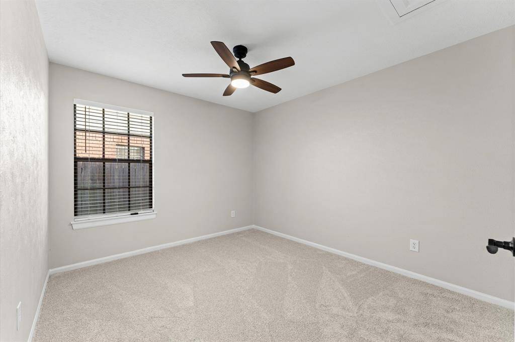 Middle Secondary Bedroom, equipped with remote control ceiling fan