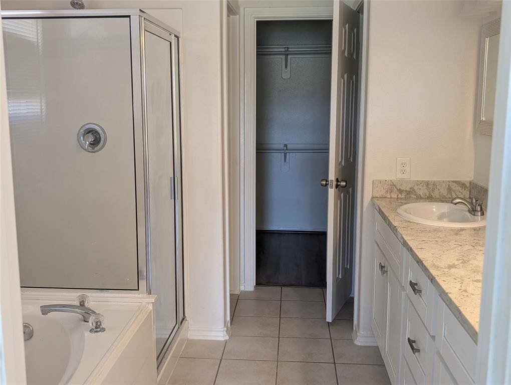 Primary bathroom and closet