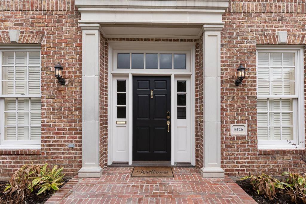 Stately entrance into this beautiful home