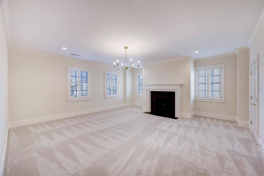 Primary Suite with fireplace & sitting area