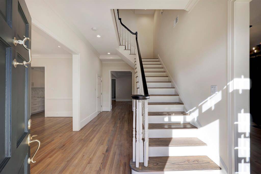 Gracious Entry with Dining to your left & Office/Living Room to your right.