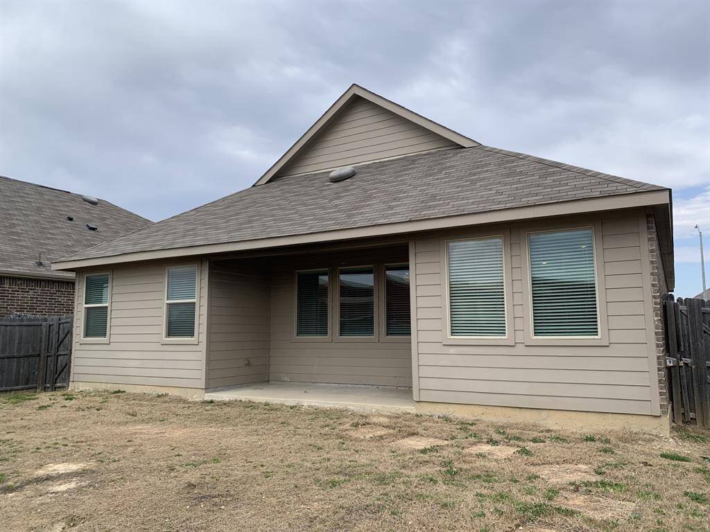 Rear with covered patio