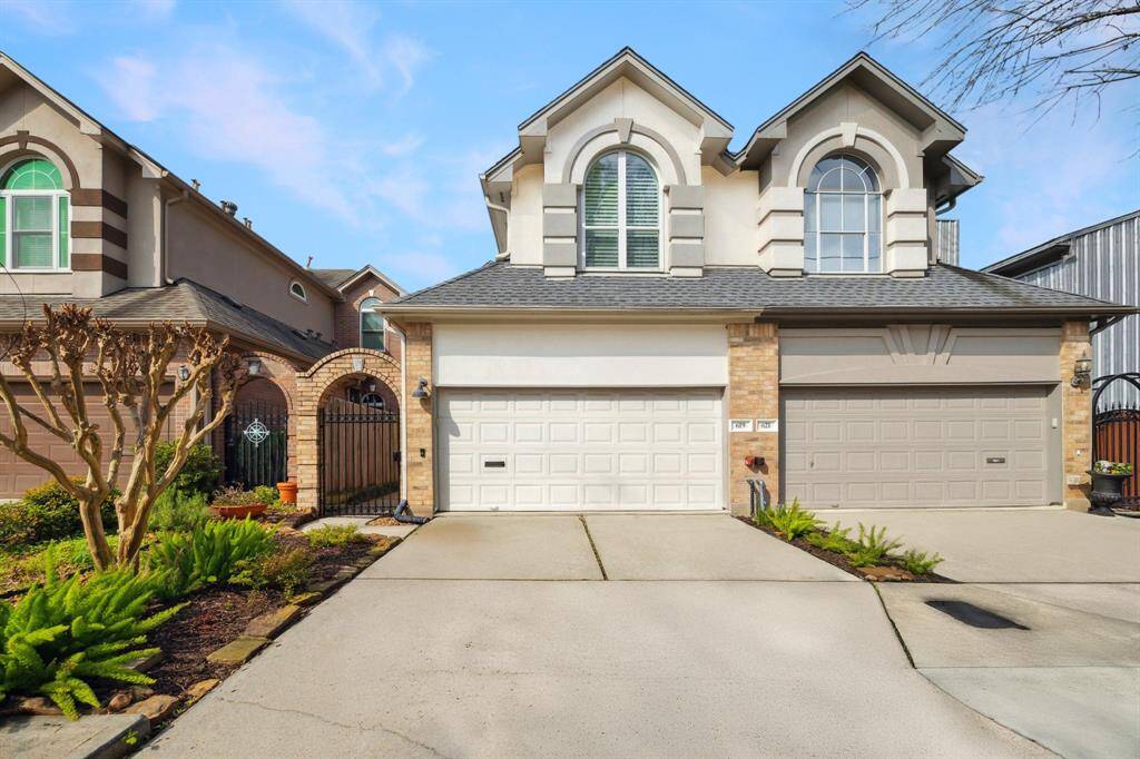 Welcome to this exceptional two-story townhome in the sought-after Rice Military area. This rare find offers convenient parking with an additional two-car space outside the attached two-car garage. You'll appreciate the secure gated entry and the stylish design featuring minimal stucco for a modern touch. Located on a fantastic block, this home is just steps away from the charming Nellie Keyes Park, providing the perfect blend of urban living and natural beauty.