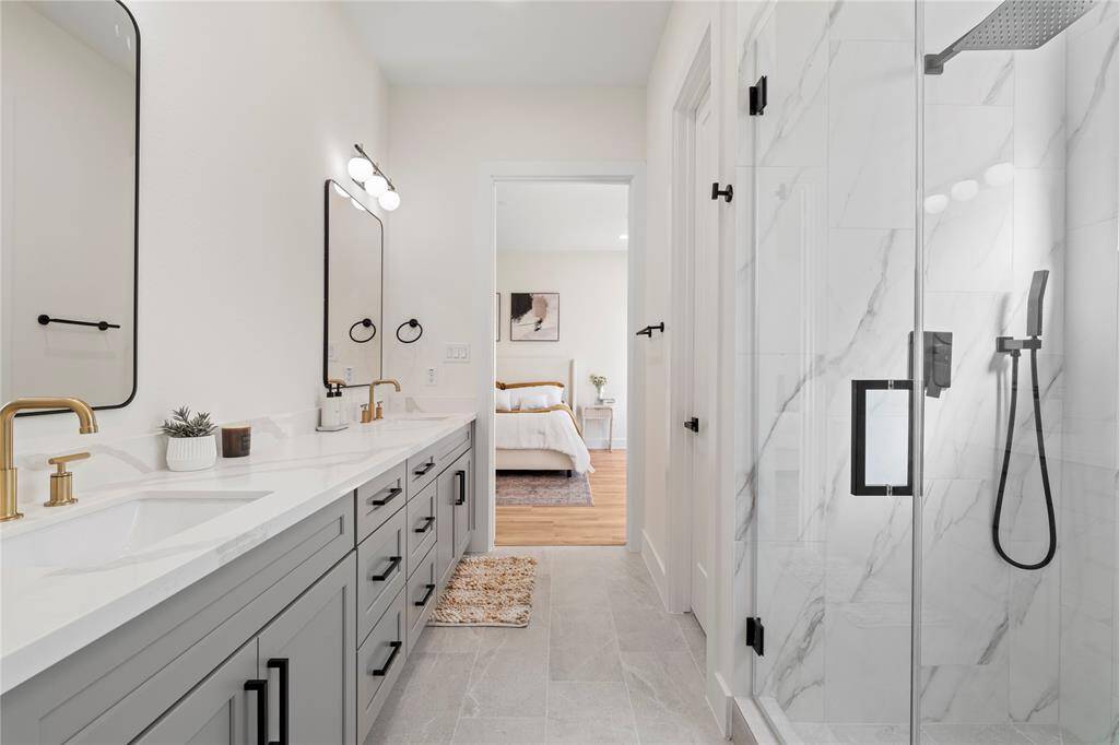 The spacious ensuite offers plenty of room, making it perfect for two with its stylish and functional design