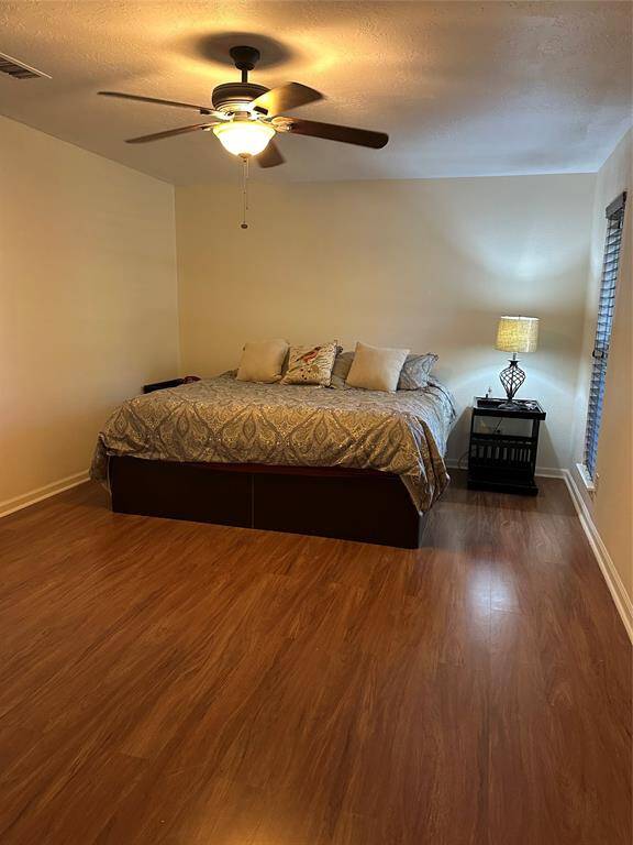 another view of primary bedroom