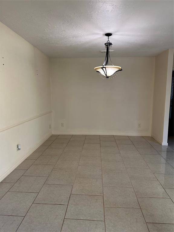 Formal dining room with updated light fixture