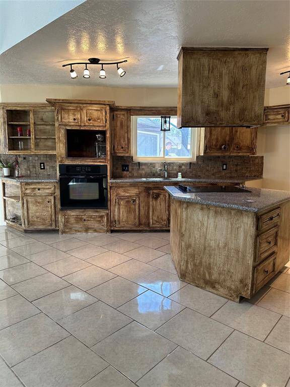Island kitchen with tons of kitchen cabinets