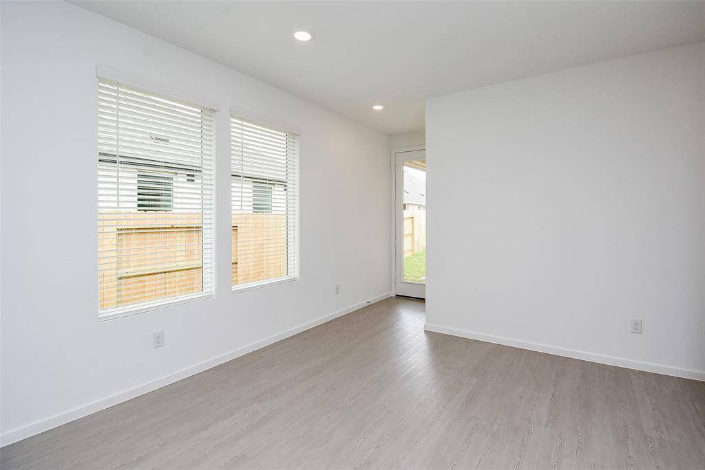 View of the kitchen dining space, perfect for your table.   Back door is to the patio.