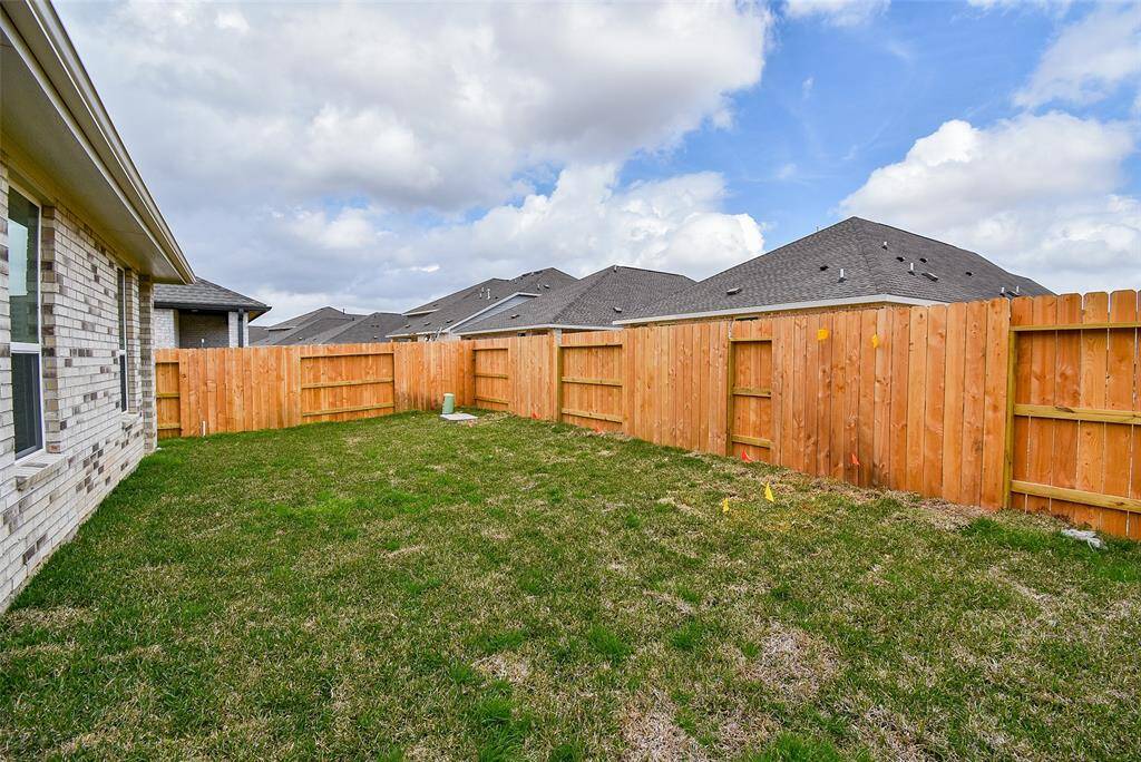 Lots of room to run and play in this yard.