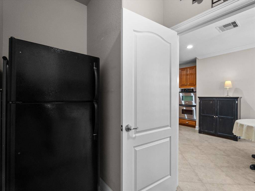 Room for second fridge or deep freezer in the laundry room!