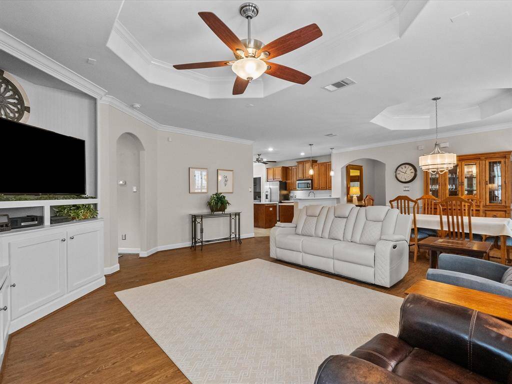Open-concept living space with, seamlessly connecting the living, dining, and kitchen areas.