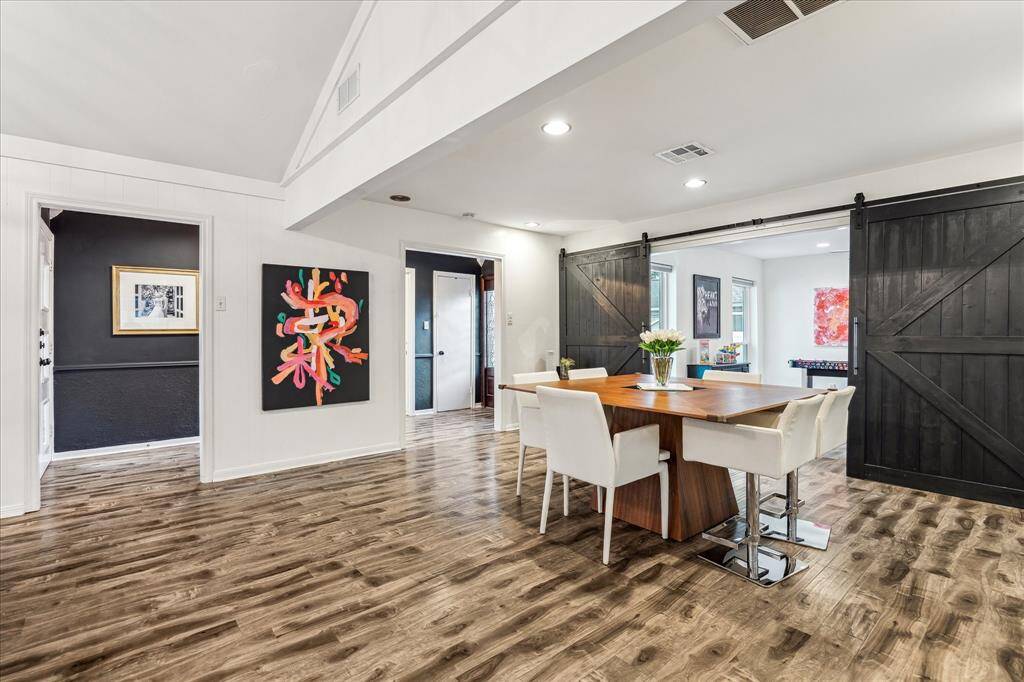 Another view of the dining room with office/playroom area open.