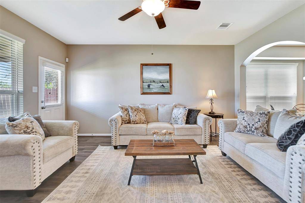 This inviting living room features neutral tones and a cozy ambiance.