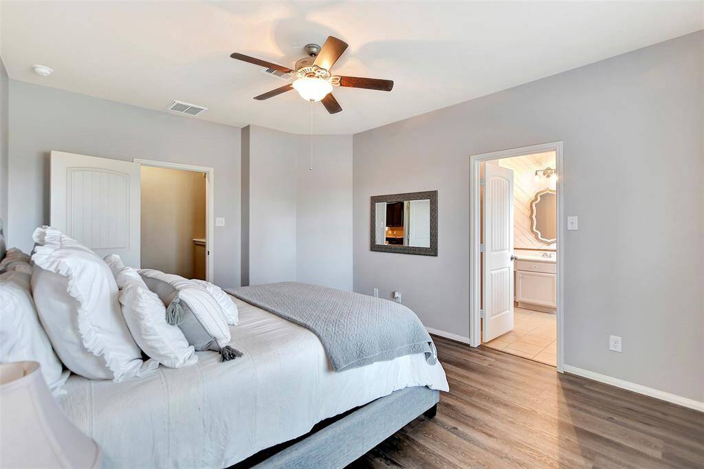 Another view of the primary bedroom.