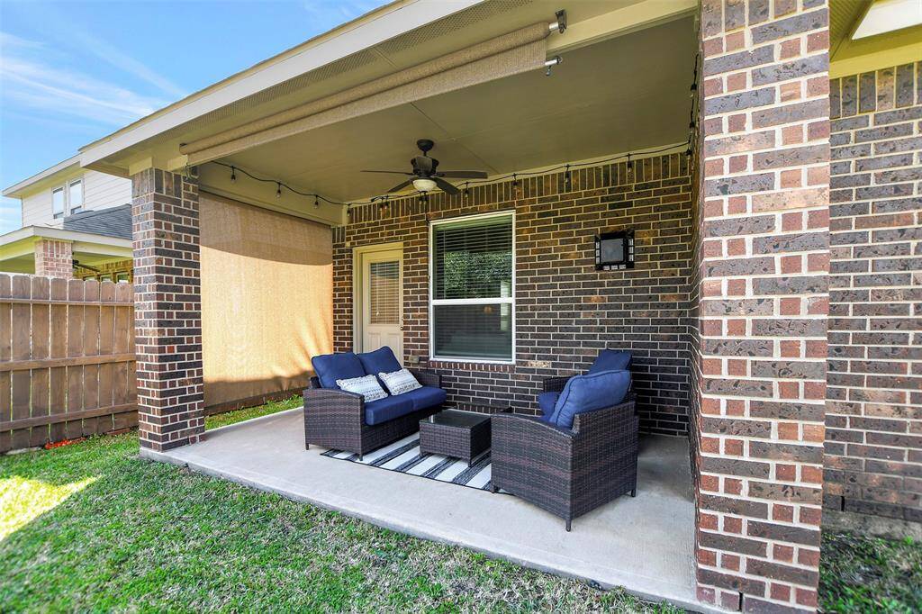 It's a comfortable space for relaxation and entertaining, with privacy provided a sunshade. The patio has 2 sunshades and extra outdoor lighting.