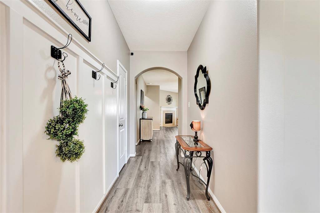 A beautiful first impression! This entryway leads to the open living area.