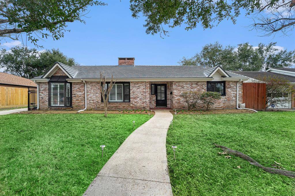 Welcome Home To 8019 Rampart St! 4 bedrooms, 2 bathrooms with detached 2-car garage, and workshop area.