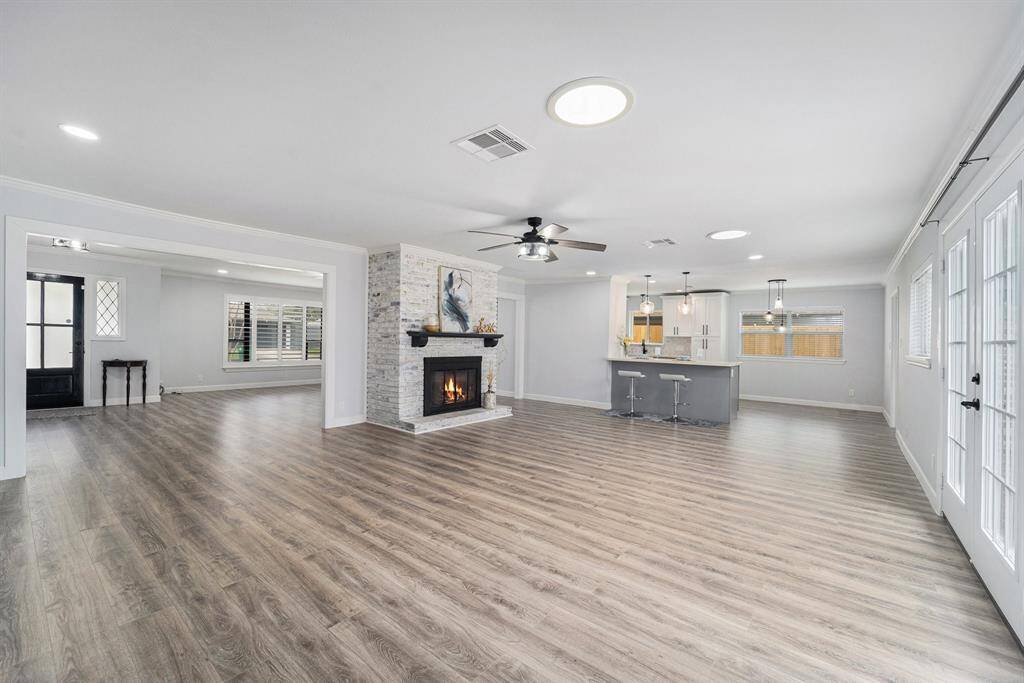 Two natural skylights in the family/kitchen area bring abundant natural light throughout the day