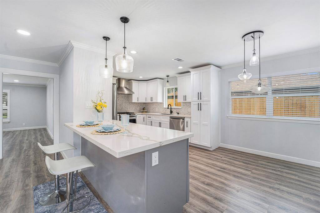 The open layout is creating a bright and inviting space ideal for cooking and entertaining