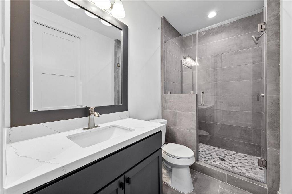 Full bath for guest and 5th bedroom