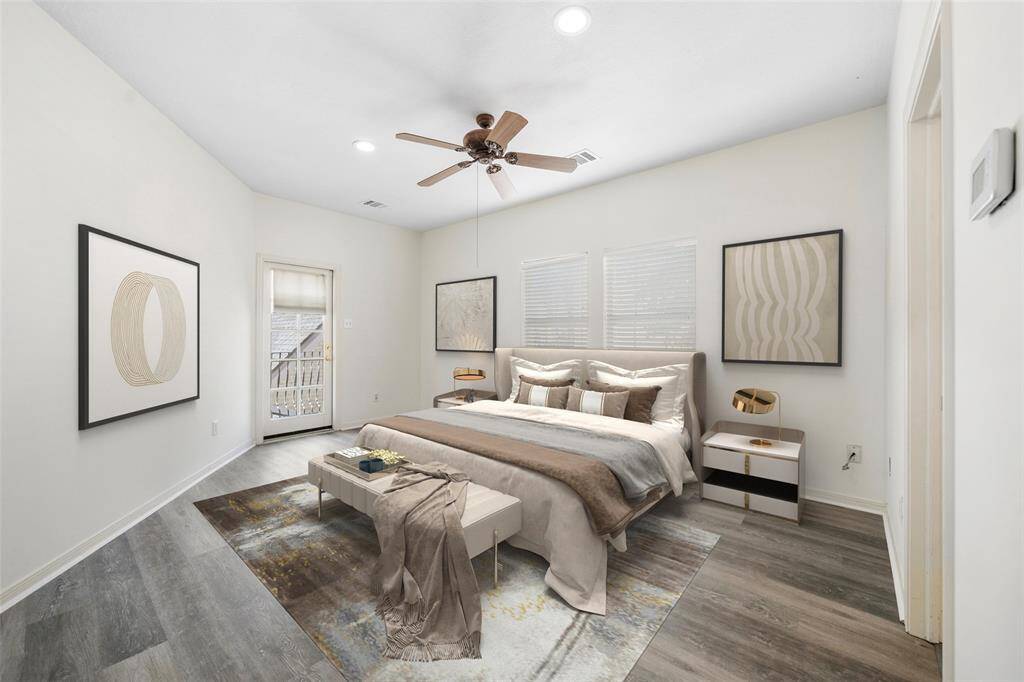 What an inviting bedroom to come home to. This primary suite greets you with beautiful natural light. Step out onto your private balcony - great for morning coffee or unwinding under the stars! *virtually staged*
