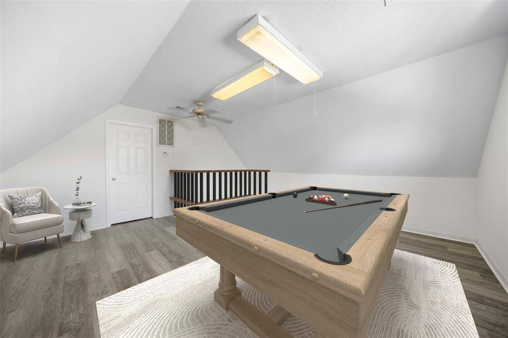 Check out this unique 3rd-floor flex room - ideal for an extra home office, game room, or a designated space to enjoy your hobbies. *virtually staged*