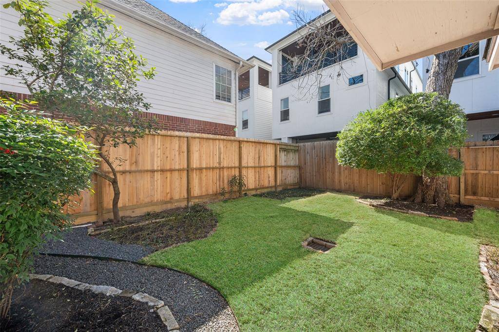 Charming backyard with enough room for gardening, outdoor dining, or simply relaxing in your private retreat!