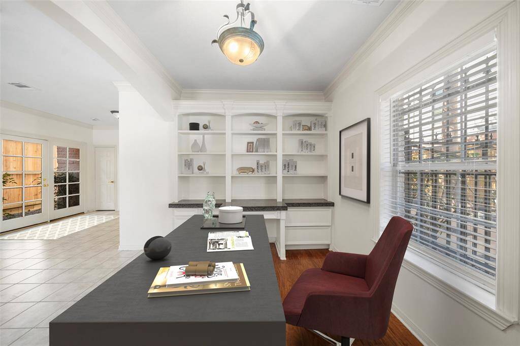 Enjoy the built-in desk with shelving - perfect for remote work or studying in this bright, sunlit space. *virtually staged*