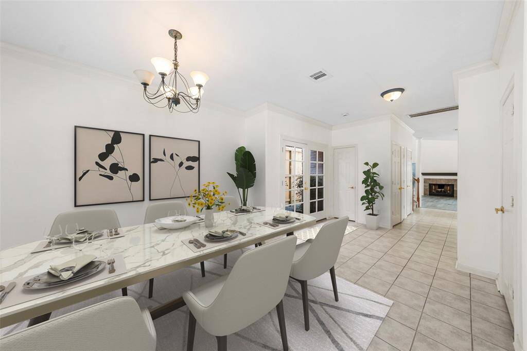 Step into this grand entrance, featuring unique French doors that bring a touch of nature to the heart of the city. *virtually staged*