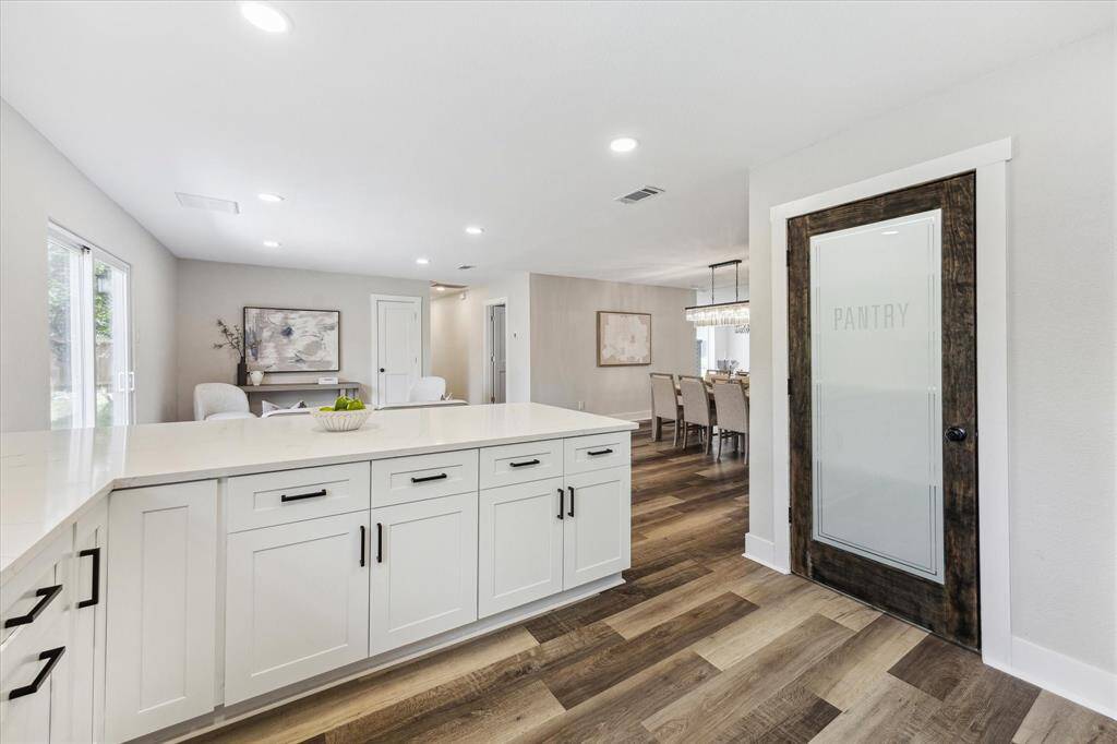 With ample cabinetry, tons of countertop space, and a large walk-in pantry, you'll have plenty of room for all your favorite kitchen gadgets here.