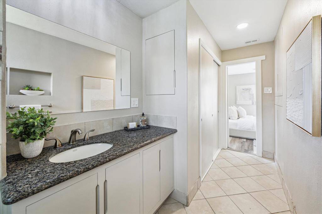 You’ll find ample storage for all of the necessities in the extended vanity and storage closet conveniently located in the primary bathroom.