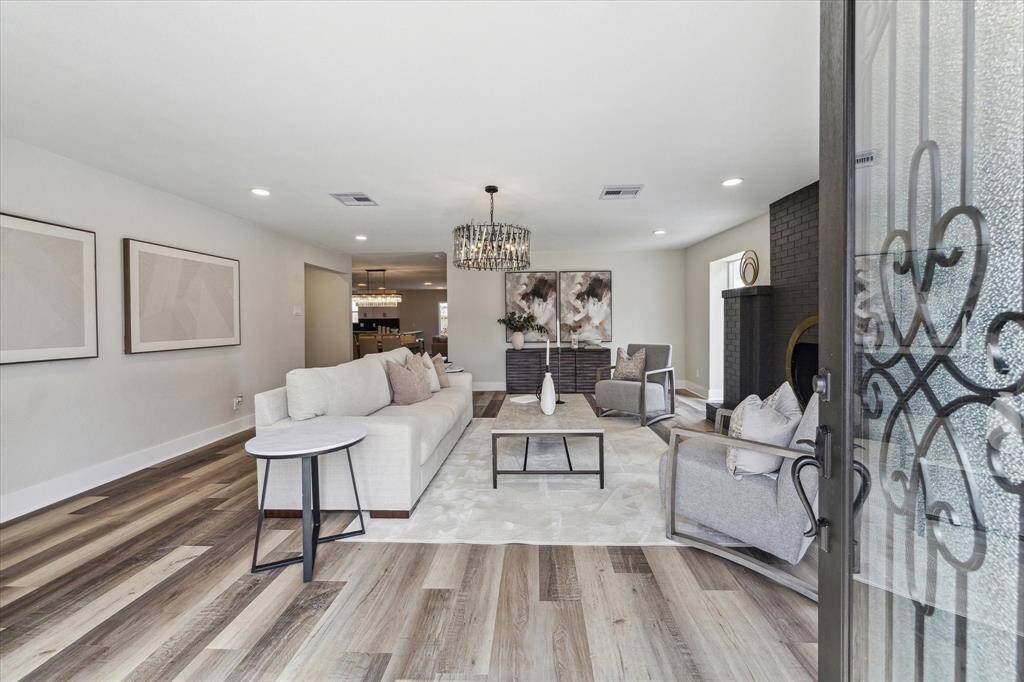 It will be love at first sight! Step inside to discover a spacious, open floor plan with high-end finishes and designer touches throughout. Every detail has been carefully crafted to blend comfort and style seamlessly.