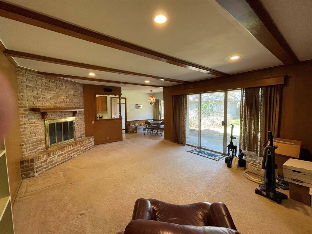 The family room is large with a huge sliding door out to the backyard.