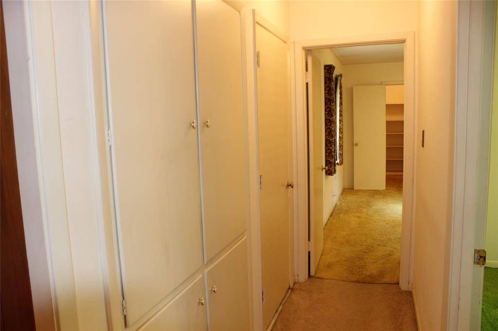 This home has a lot of storage space in the hallway as well as a bedrooms
