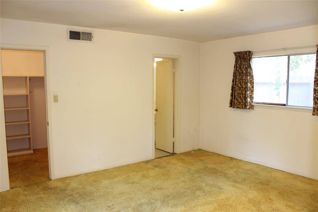 Primary bedroom is large with an ensuite bathroo.