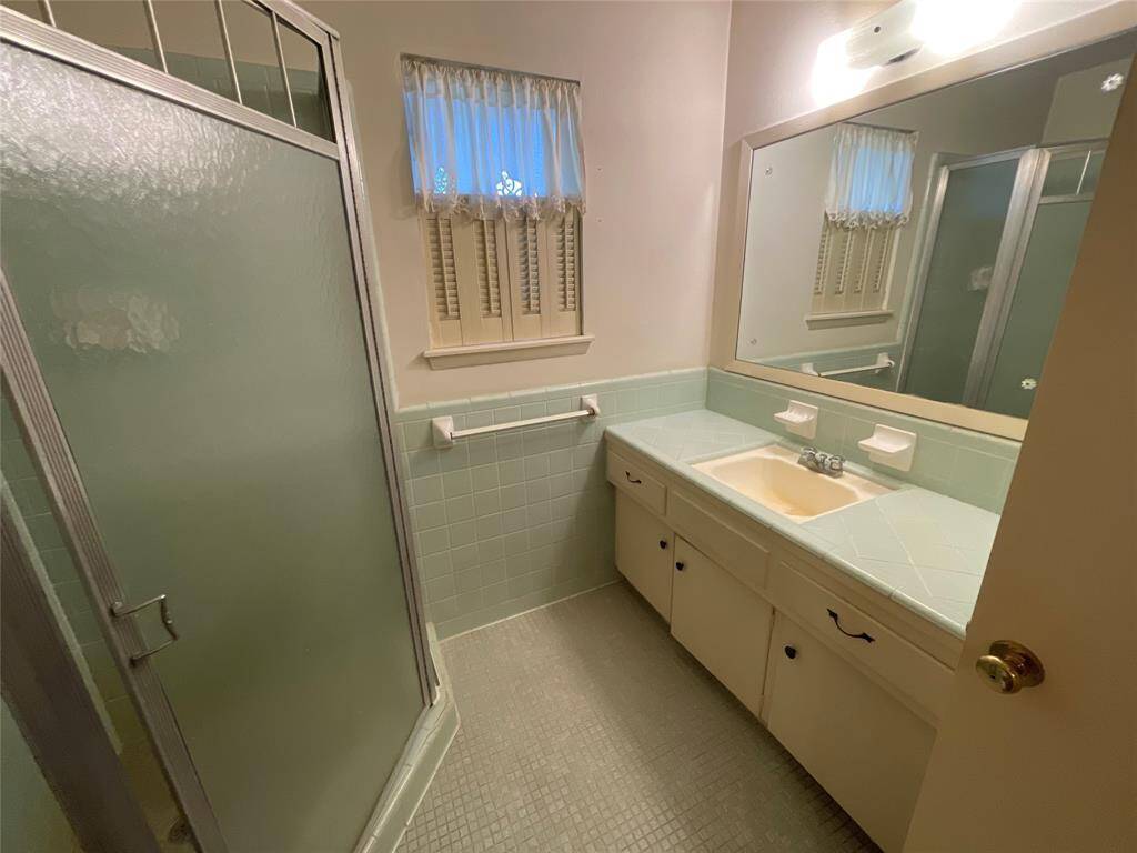 The tile throughout the bathrooms is in great condition.