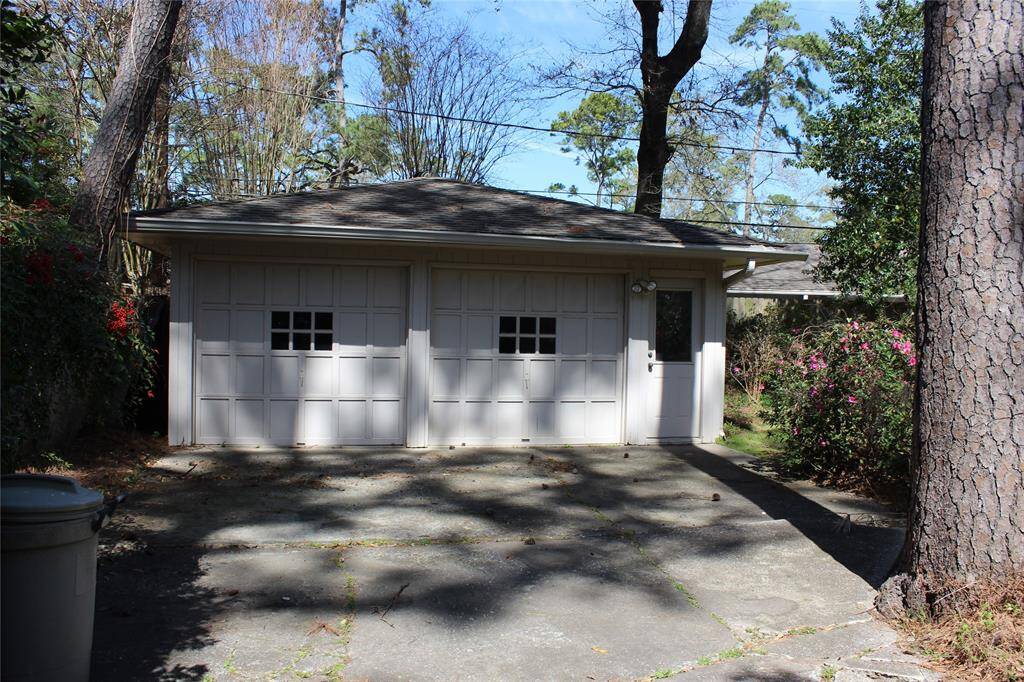 Detached garage is large. Giving you room for cars and projects